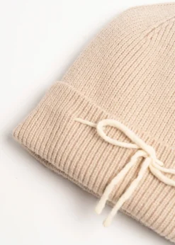 Cuffia Cladys con fiocco a contrasto