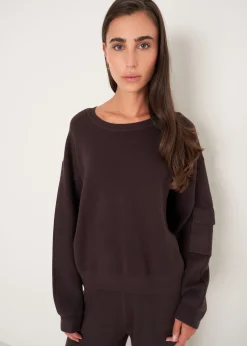 Maglia Monia con tasca sulla manica