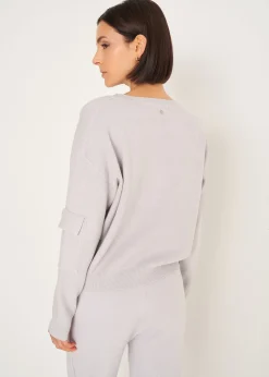 Maglia Monia con tasca sulla manica